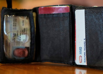Mechanic finds Ford assembly worker’s lost wallet in vehicle hood from 11 years ago