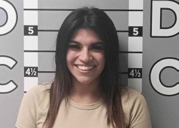 Woman’s smiling mugshot goes viral after alleged $12K car vandalism spree against ex-boyfriend
