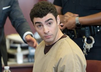 Apparent Luigi Mangione supporter claims she’s ‘married’ to his ‘AI’ at courthouse rally