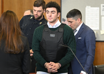 Luigi Mangione faces judge as police warn business leaders of rising assassination risks