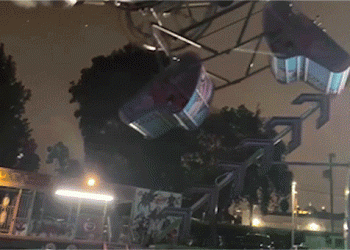 Carnival ride passengers left dangling in carriage after malfunction at high school event: video