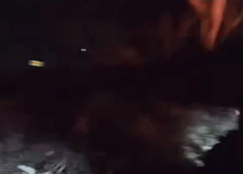 Driver narrowly escapes fiery car explosion as officers rush to rescue trapped man